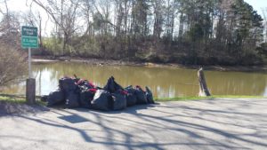 29 bags of trash waiting for pickup.