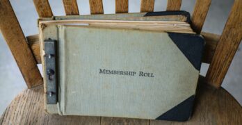 a book sitting on top of a wooden chair